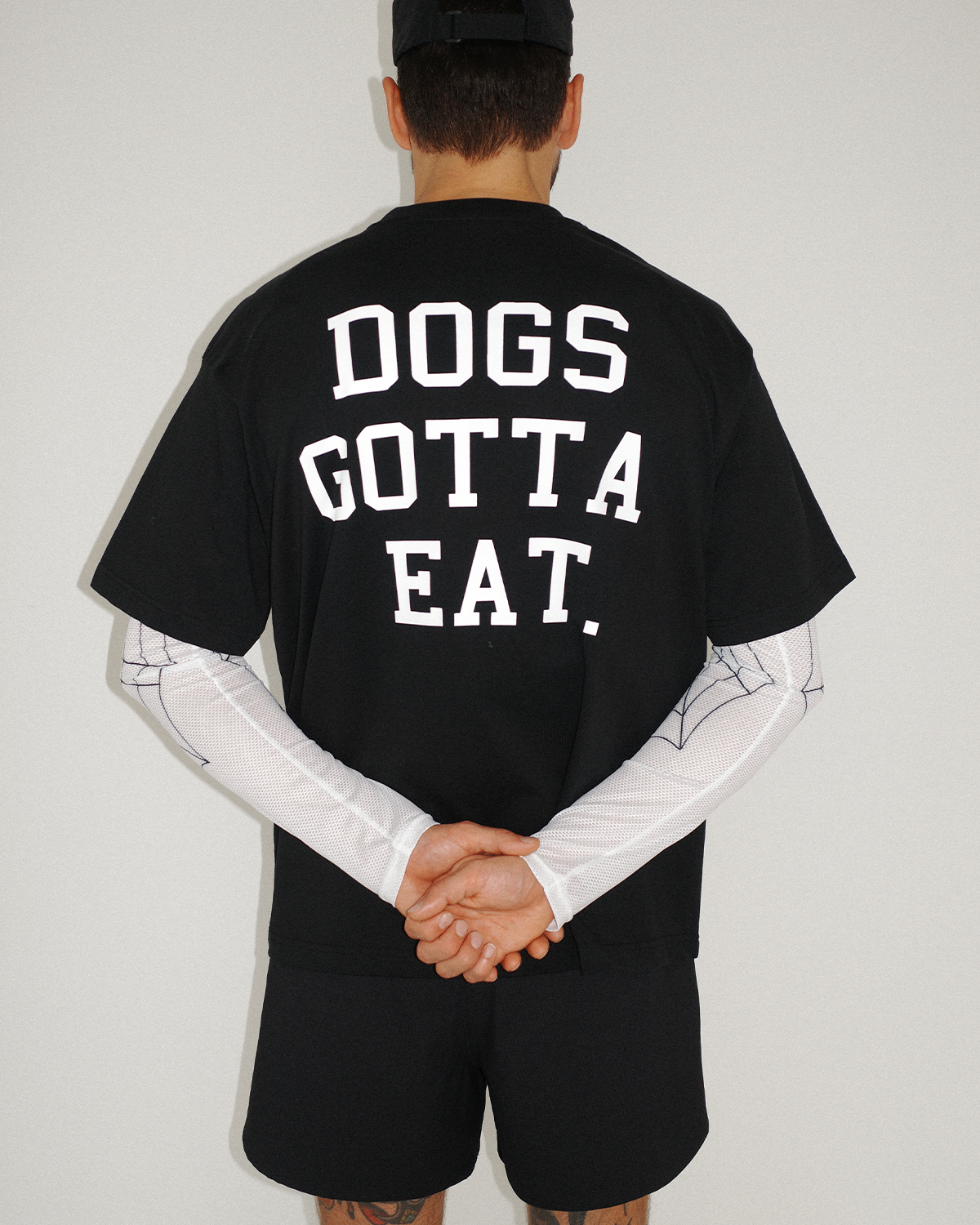 Dogs Gotta Eat Tee Black